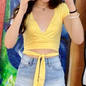 Yellow low neck crop top with tie in the back